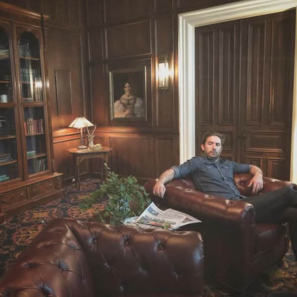 Lounging in the leather chair